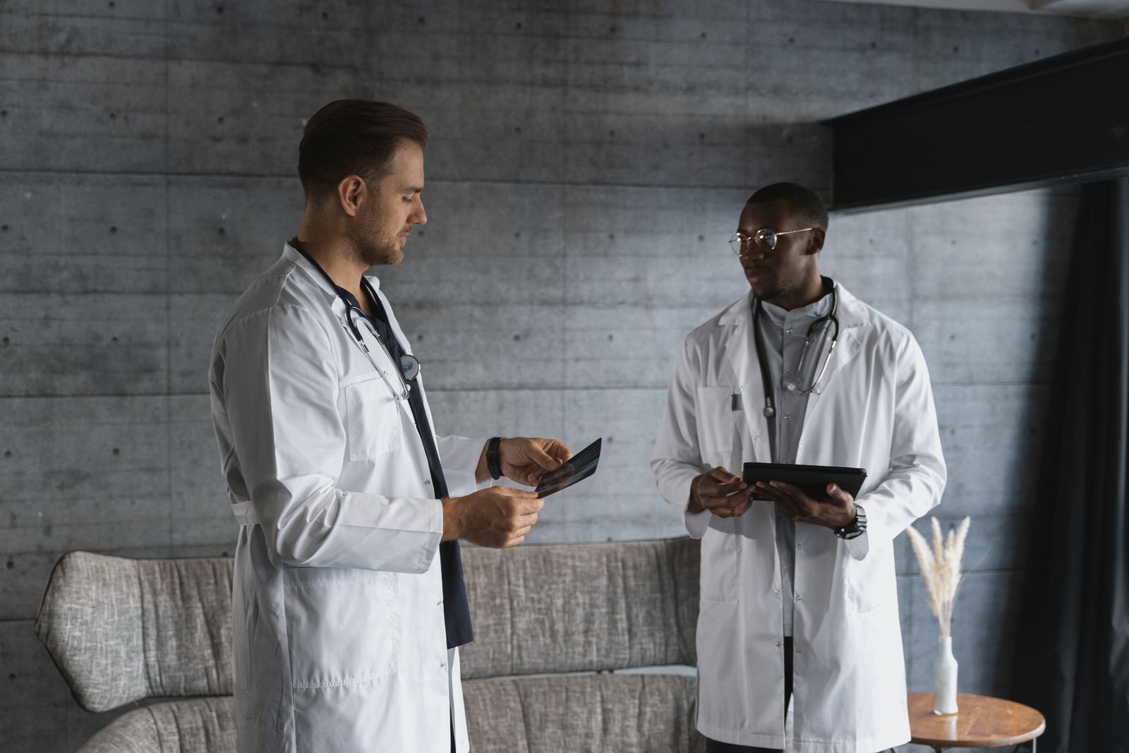A healthcare team planning together in a clinic meeting room