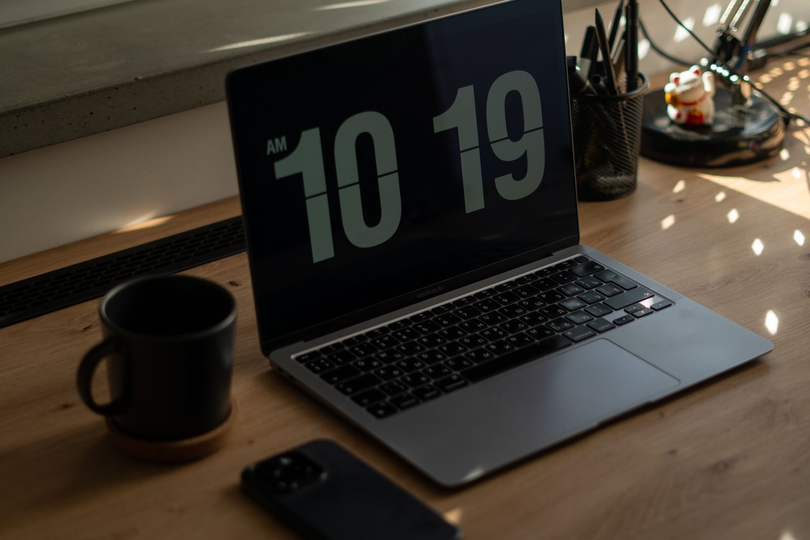 Black Digital Alarm Clock at 1:00