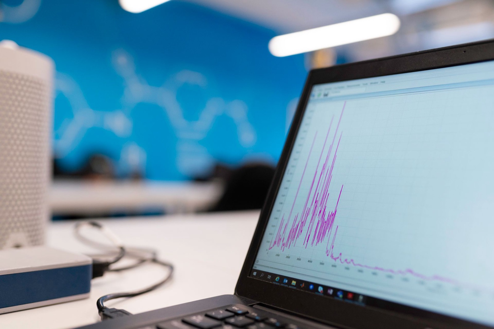 A performance graph displayed on a laptop screen