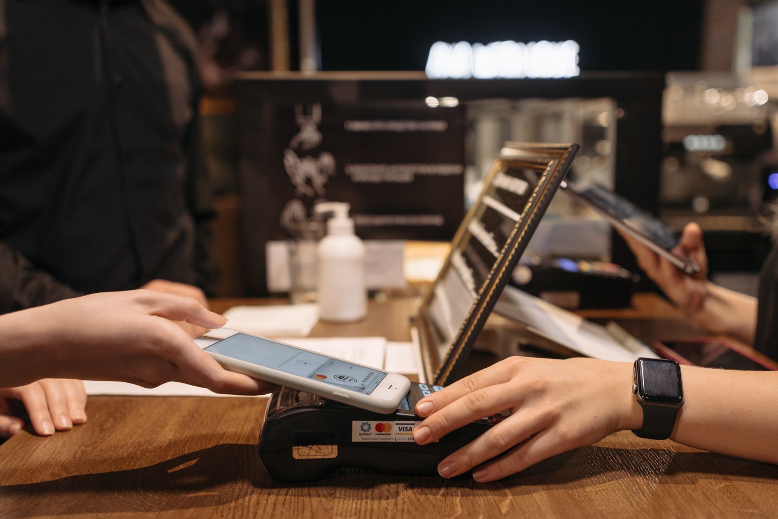 Paying with phone at shop counter