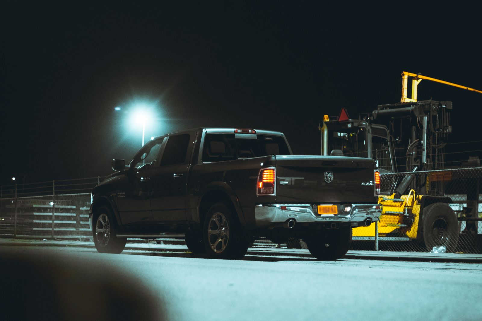 Black Pickup Truck on Road during Night Time