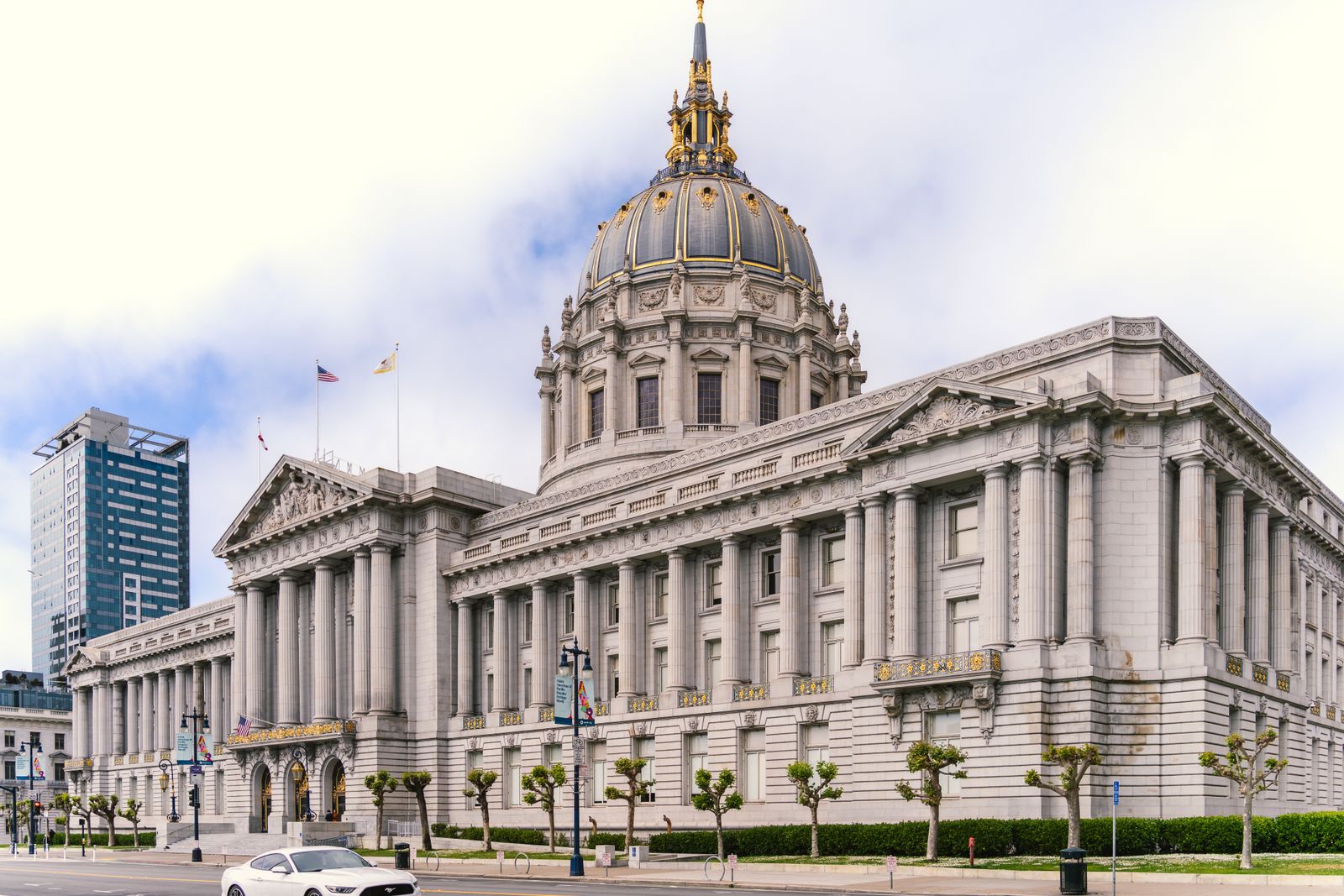 A city hall building seen from the street
