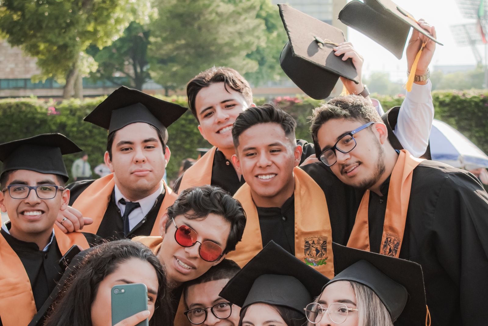 Smiling Graduates Taking Selfie