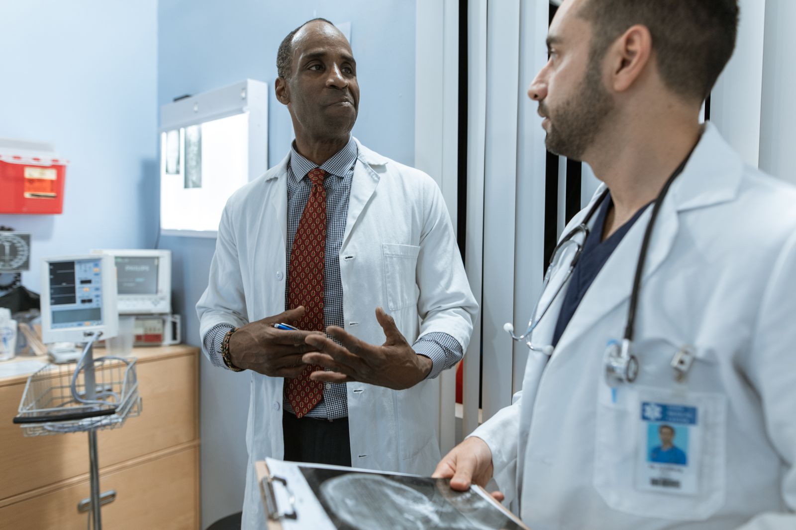 Two doctors talking in a clinic